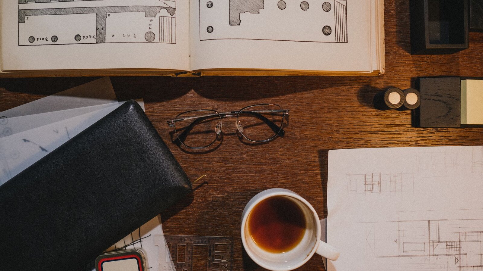 Architectural drawings and tools representing family office AI design choices