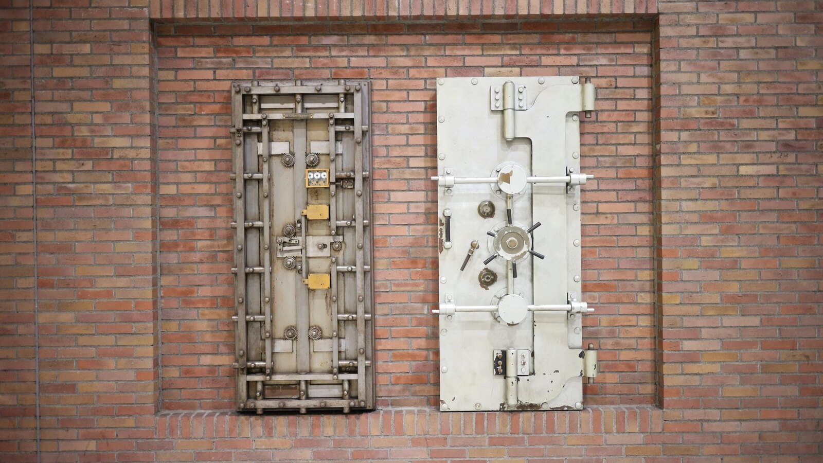 Steel vault doors representing private-wealth AI trust boundaries